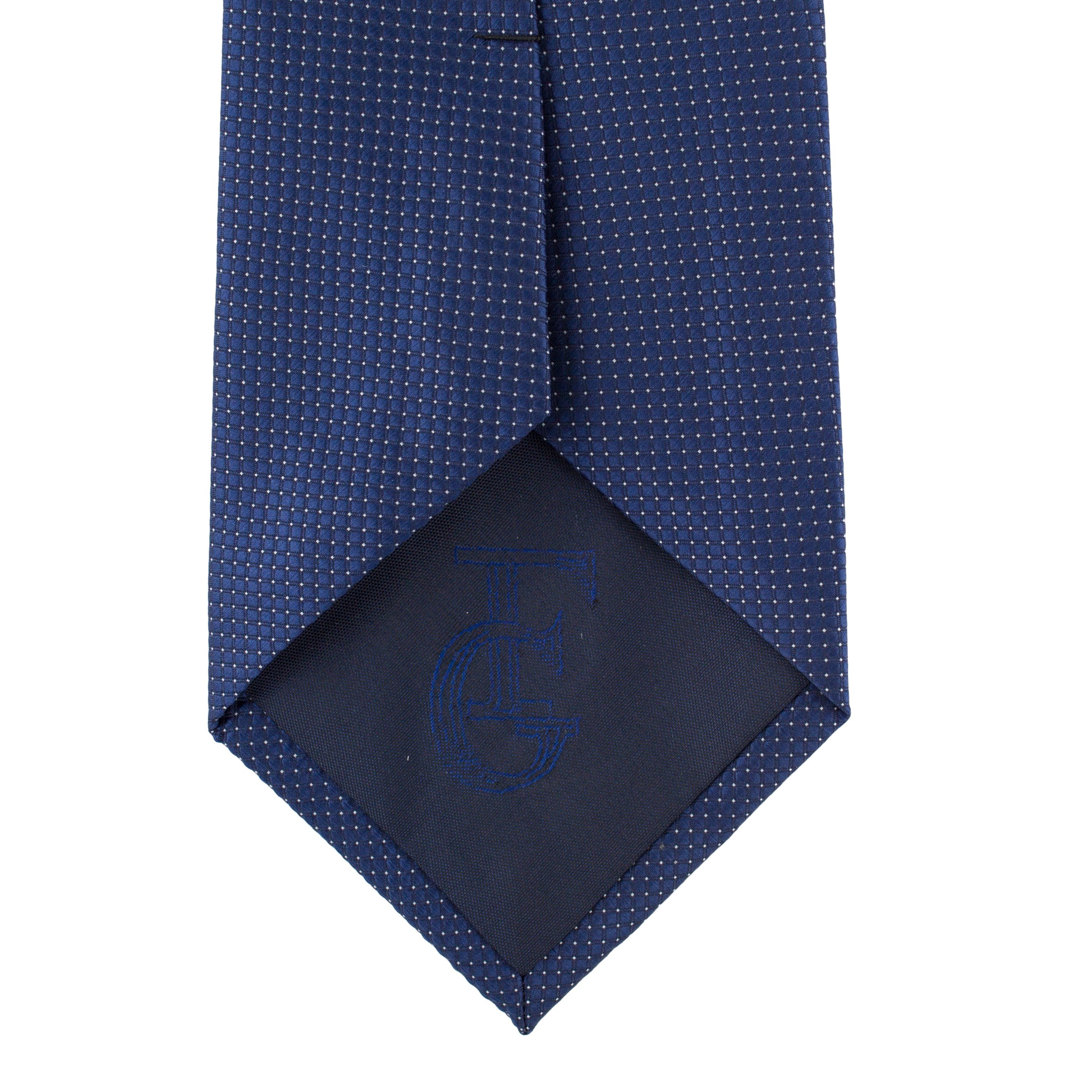 Cravata bleumarin cu picouri albe